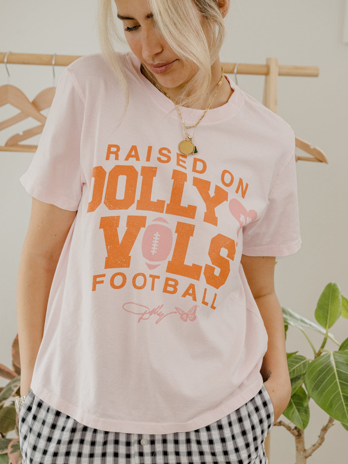 Raised on Dolly Parton & TN Vols Pink Football Pink Ellie Heavyweight Tee
