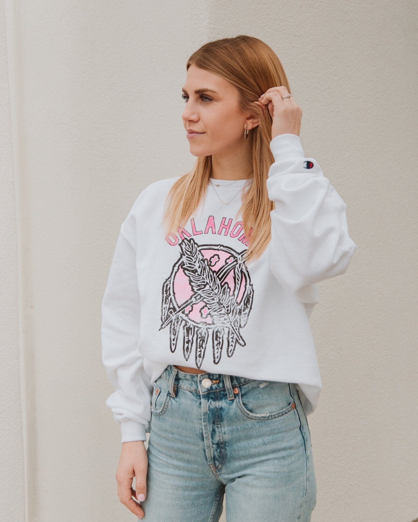 Oklahoma Sticker Shield White Sweatshirt with Pink Letters - shoplivylu
